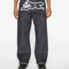 Pantaloni de tâmplar din denim cu Running Dog alergând pe marginea țesăturii