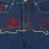 Pantaloni din denim cu câine alergând din cristale