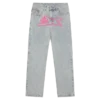 Pantaloni din denim cu două buzunare și câine alergând
