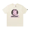 Tricou cu insignă roz