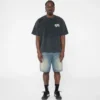 Tricou cu mâneci scurte și imprimeu decolorat Tricou cu mâneci scurte și imprimeu decolorat